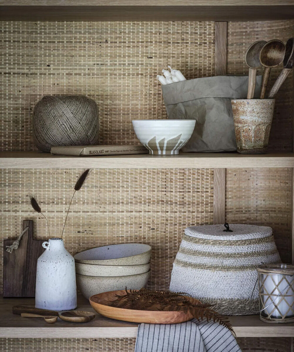 Wabi sabit shelf with natural colors and household items made from natural materials